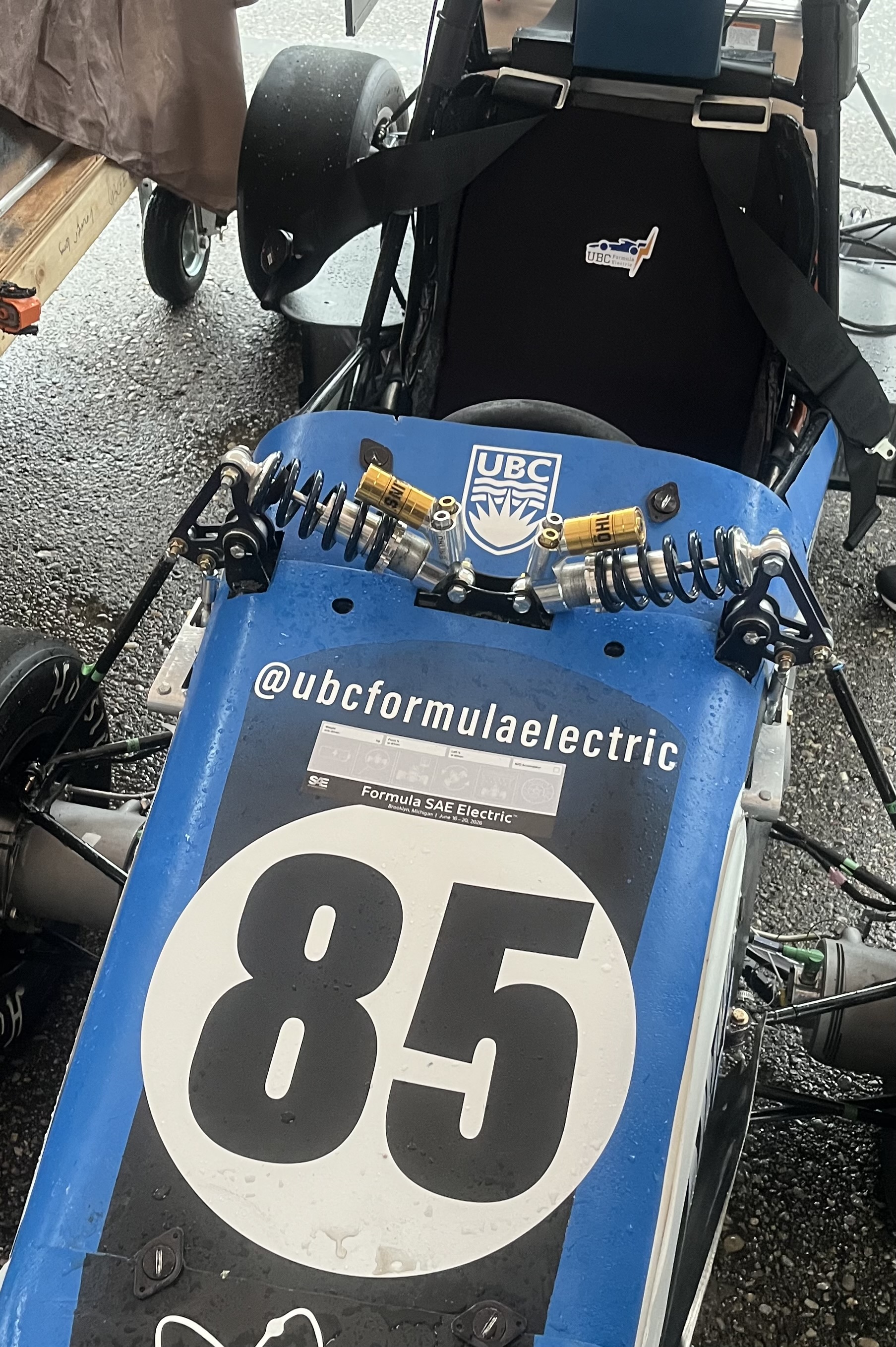 Bellcranks installed on the car with the left bellcrank highlighted